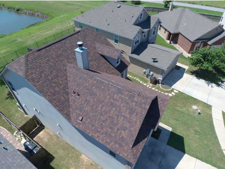 House with Newly Installed Shingle Roof