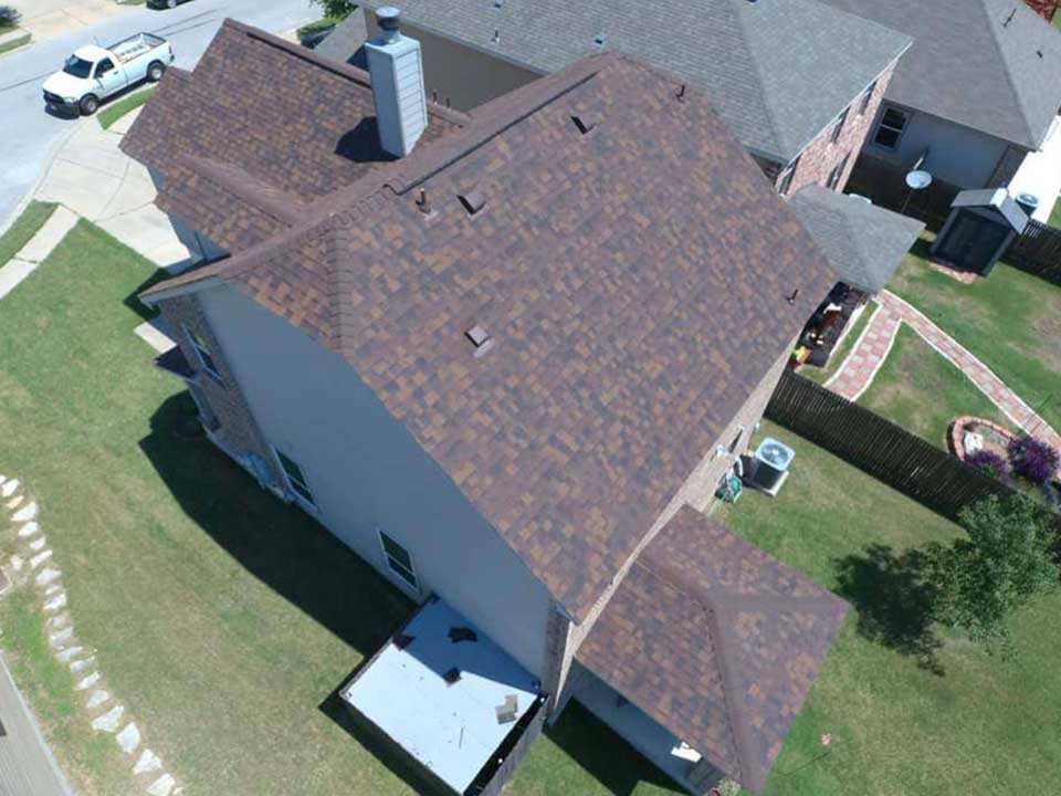Residential House with Roofing Shingles
