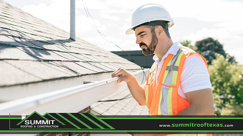 Summit Roofer Inspecting a Shingle Roof